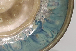 Closeup of Porcelain dish with Honeycomb and Muddy Waters glazes