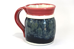 Porcelain mug with Ruby, transparent, Black Gloss, and Night Moth glaze combo.