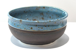 Porcelain bowl with Shipwreck glaze on inside and rim, and Copper Ore on outside.